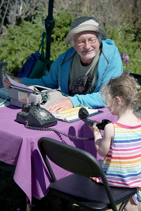 Child holding telephone handset